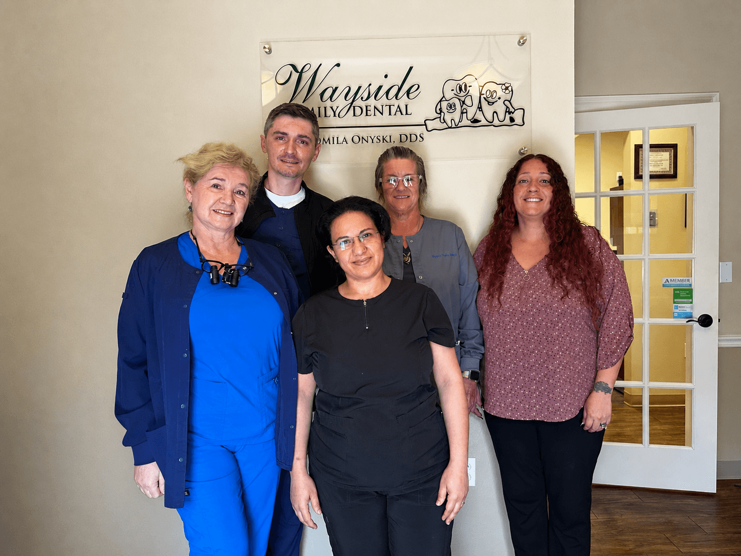 Dr. Onyski with the Wayside Family Dental team